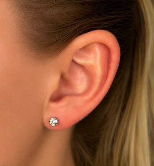 Diamond Earrings 0.60ct worn on ear