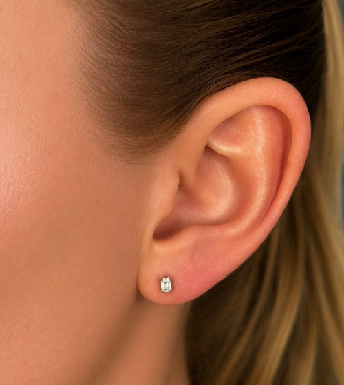 Emerald Cut Diamond Earrings worn on ear