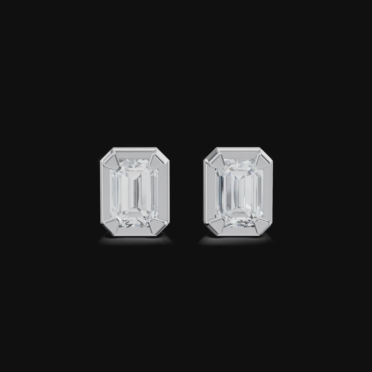 Emerald cut demantseyrnalokkar
